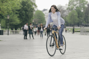 Tratar Bikes wooden bicycle during commuting in Vienna, Austria